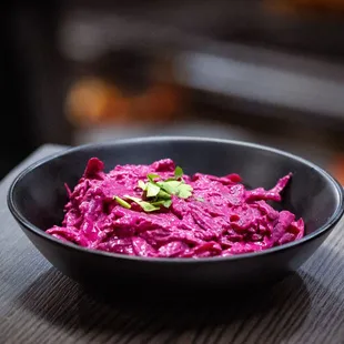 Tender red beets served with a creamy Greek yogurt dressing, gently seasoned with garlic and a hint of aromatic spices.