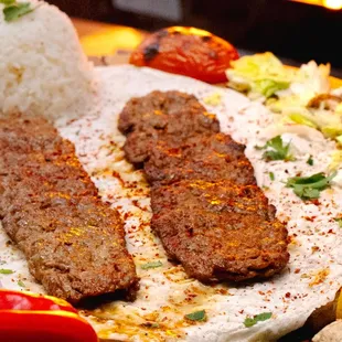 Tender boneless chicken cutlets are marinated in creamy yogurt and spices, then grilled to bring out their juicy flavor.