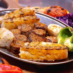 A savory sauté of eggplant, tomatoes, vibrant peppers, and garlic in olive oil. This hearty blend offers a warm, comforting the taste.
