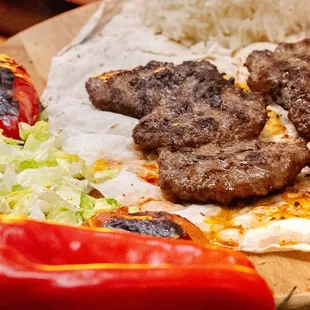 Minced beef meatballs infused with a special blend of spices and grilled until juicy.