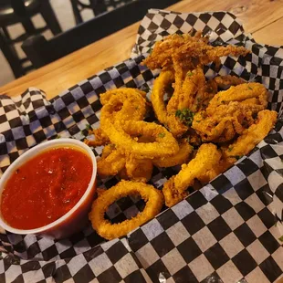 Calamari. | Hot and crisp in basket, small portion for $14.99.