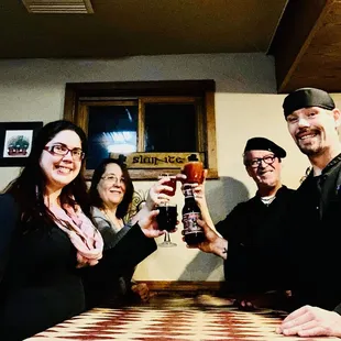 a group of people toasting