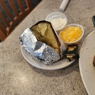 Soft and fluffy  baked potato.