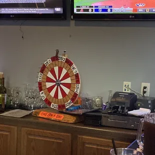 a dart at the center of the bar