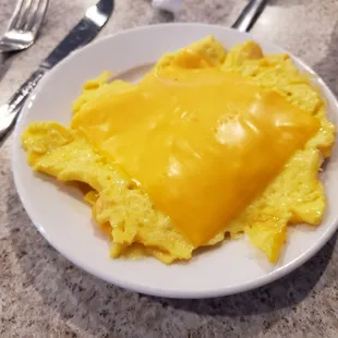 Second time ordering scrambled eggs and asking for cheese. I mixed them up and the cheese was incorporated into the eggs.