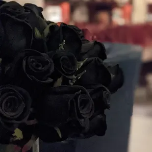 a bouquet of black roses