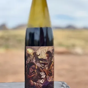 a bottle of wine sitting on a table