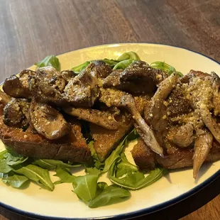 Vegan Crostini contians Cashew &amp; Mushroom on potato bread.