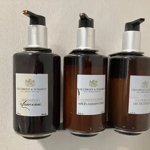 three bottles of shampooing
