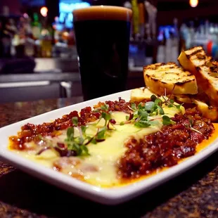 New Belgium Tap Takeover Special: Baked Triple Crème Brie &amp; Warm Bacon Jam with Grilled Focaccia Crostini - paired with 1554 Black Lager