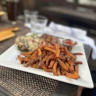 Ribeye steak with black truffle butter and garlic kale.
