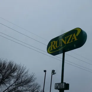 a sign for a runza restaurant