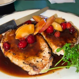 This is a special. Not on regular menu.  Pork chops with apple and cherry sauce.  Extremely good. Wish they would add this to the menu.