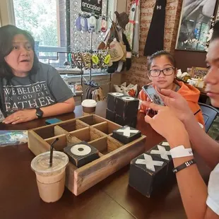 Enjoying caramel macchiatos and old fashioned tic tac toe