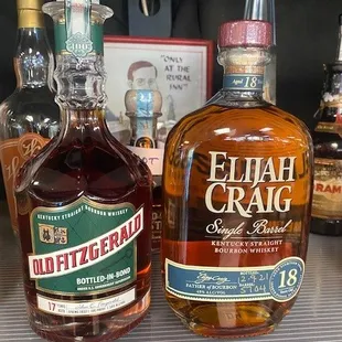 two bottles of elijah craig and old fitzgerald