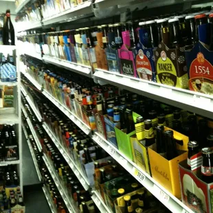 shelves of beer in a grocery store