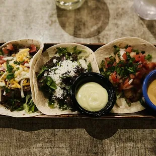 Tacos! L to R: Why So Serious (no crema), Fat Guy in a Little Coat (aioli on the side) and Lookin Good Louis (aioli on the side)