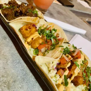 a long platter of tacos