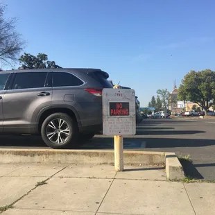 No parking sign that is at entrance of our lot.