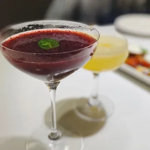 two cocktails on a table
