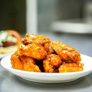 a plate of chicken wings