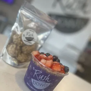 Rush Bites Rolled in Granola, Mai Tai Bowl with Blue Spirulina, topped w/strawberries, blueberries and granola. Rush Bites Rolled in Granola