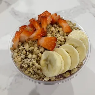 strawberries, bananas, and granola