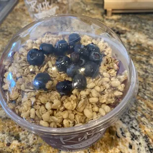  bowl of granola with blueberries
