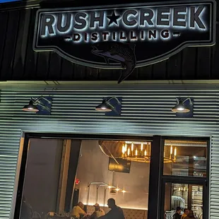 Large garage doors with screens let the breezes in and keep the bugs out