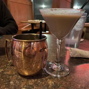 a martini and a copper mug