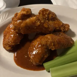 Dollar wings on Tuesday. They are breaded unless requested plain. Very juicy!