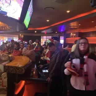 a crowd of people watching a game