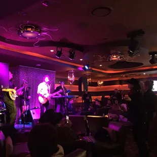 a band playing on stage