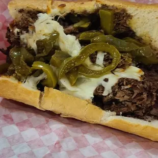Italian beef with cheese and sweet peppers