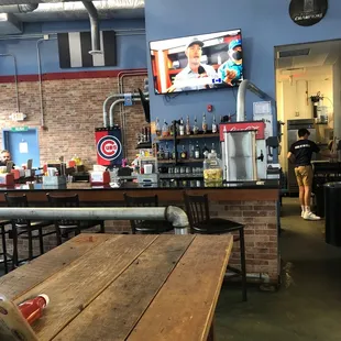 a bar with a television in the background