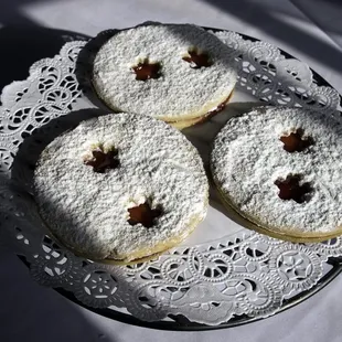 four pastries on a plate