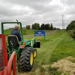a man driving a tractor