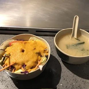 Miso soup and salad with ginger dressing. We had both