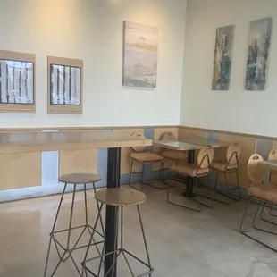 Empty tables and empty &quot;coffee shop&quot; during the mid-morning rush, due to the excessive air conditioning.