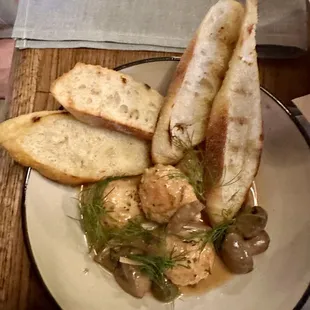 Chicken Swedish meatballs with mushrooms, dill, and toasted baguette.