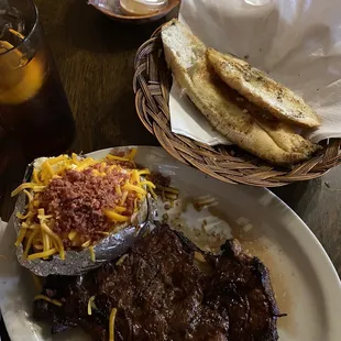 18 oz ribeye w/loaded potato
