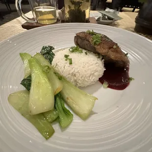 Roasted duck with plum sauce and bok choy