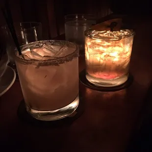 two cocktails on a table