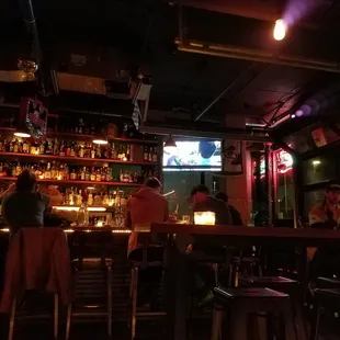 people sitting at a bar