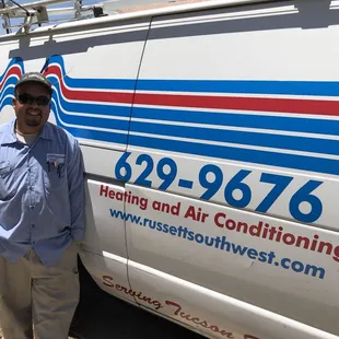 a man standing in front of a van