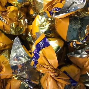 a pile of wrapped chocolates