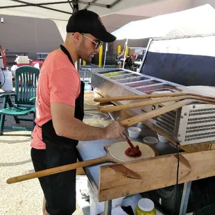 Co-owner Anthony Russo making pizza at an event using our mobile set up!