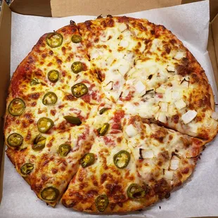 Half pepperoni and jalapeño and half sausage and onion