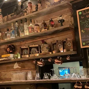 shelves of bottles and glasses