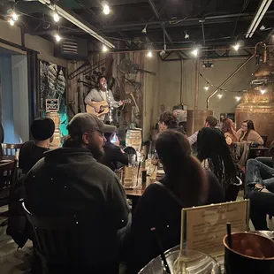 a group of people sitting around a table
